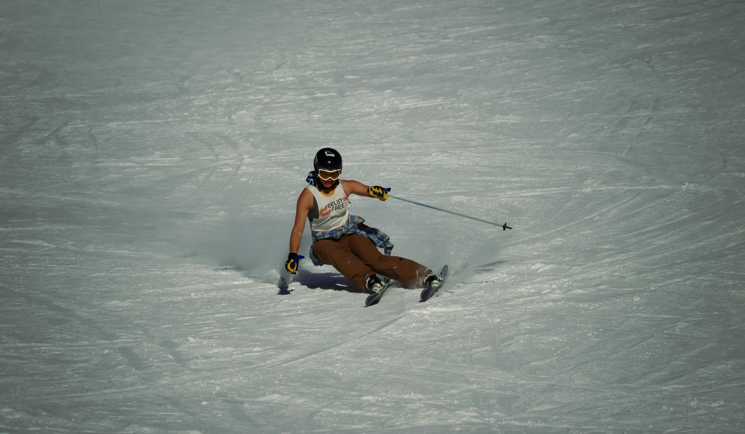 Diverse group of people training with kettlebells and medicine balls in a gym