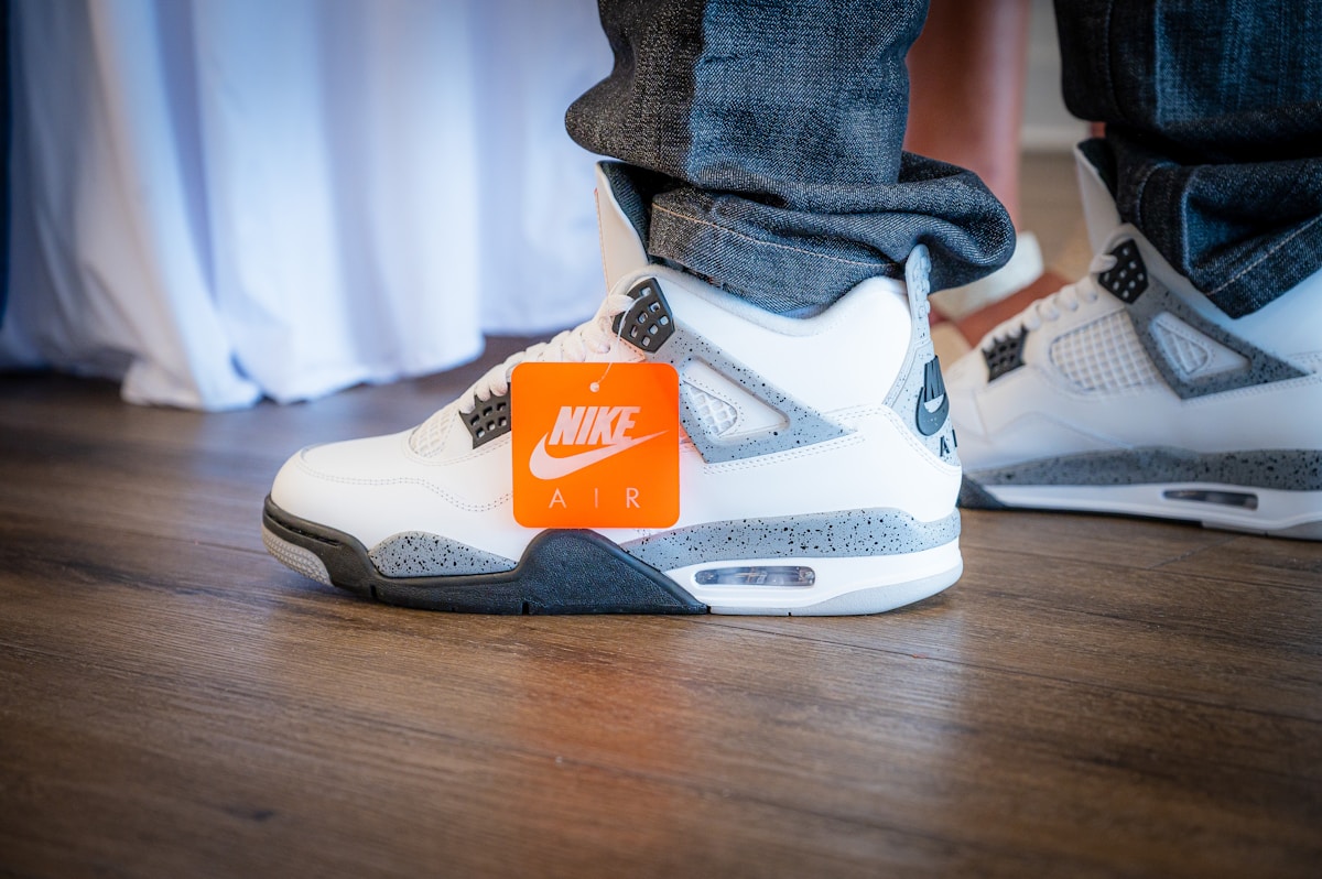 Close-up of a white nike air jordan shoe with tag